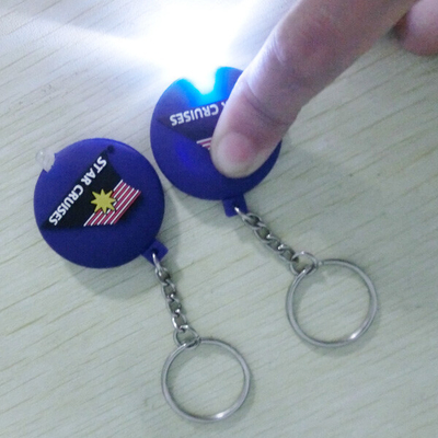 Ein doppeltes mit Seiten versehenes weiches PVC Keychain, Taschenlampe Keychain der hohen Helligkeits-LED